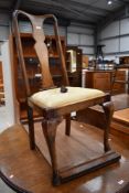 A 1920's stained frame Q Anne style dining chair
