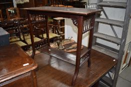 A Victorian hallway side table having carved mahogany frame with turned gallery supports