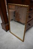 A gilt frame wall mirror, approx 85 x 55cm