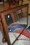A modern large mahogany effect frame wall mirror, appros 112 x 50cm
