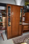A vintage oak and ply wadrobe
