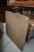 A vintage ply top drawer leaf dining table with removable legs