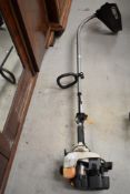 A Ryobi garden strimmer