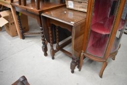 A traditional kitchen gate leg barley twist oak table