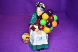 A Royal Doulton figure, The Old Balloon Seller, HN 1315