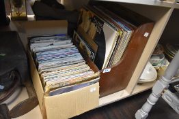 A good selection of 45 rpm and 33rpm singles albums and Ep's including 80's interest and rock etc