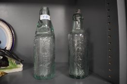 Two local interest pop or soda advertising bottles for Underwood Mill Carlisle and Stothert