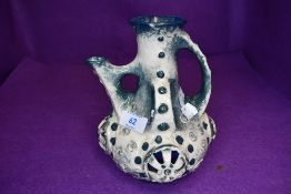 A reticulated pitcher by Imperial Amphara works Austria Morania