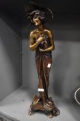 A large art nouveau figure of a semi nude approx 80cm tall