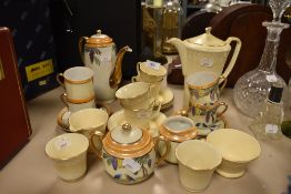 A part coffee service by Crown Devon in an Art Deco design and similar tea set