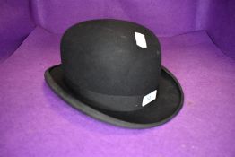 A felt bowler hat of good size retailed by Linney of London
