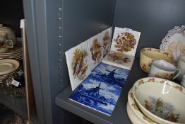 A selection of transfer printed mid century tiles having hunting themes