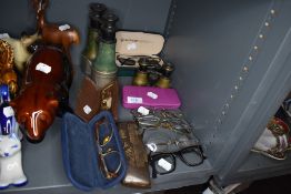 A selection of spectacles and binoculars