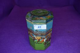 A vintage novelty octagonal shaped Grand National game tin, with lid having a spinning top,which