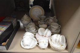 A selection of tea cups saucers and a Victorian tea service in a Mintons style