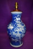 An antique Chinese blue and white porcelain vase decorated with cherry blossom approx 40cm high