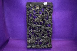 An early 20th century middle eastern or oriental style hand carved diorama of soldiers in battle