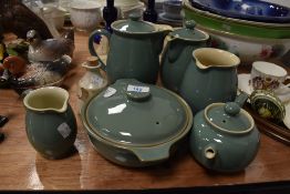 A selection of tea and bake wares by Denby in a green and cream colour way