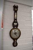 A late Victorian banjo style barometer having silvered bulls eye mirror and chased enamel dial in