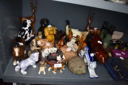 A selection of various animal figures and figurines including Hedgehog