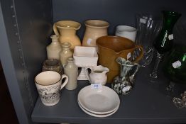 A selection of ceramics and earthen ware including Heysham Church cup and water jugs