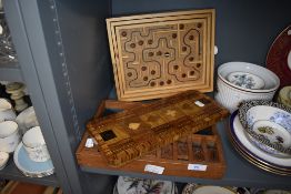 A selection of wooden games and boards including veneer inlayed Cribbage board