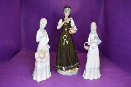 Three Spanish figure or figurines by Gama and Valencia of maidens with dove dog and flowers