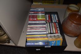 A selection of compact disk and cd's also tape cassette