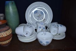 A collection of Wedgwood having blue rose pattern included are cups and saucers, plates and more.