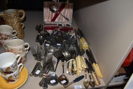A selection of various flat ware cutlery and table settings including Fenton bros
