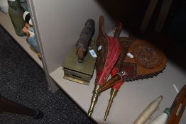 Three fire side bellows and a heavy cast brass stove iron having Chinese lettering to back