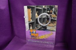 A perspex pub or tavern advertising mirror for Babycham