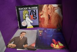 A selection of vinyl albums and Lp's including 80's electro and rock