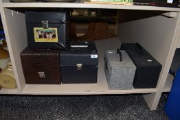 Three vinyl carry cases or 45rpm singles with a good selection of various 7inch singles