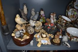 An assortment of animal figurines and similar.
