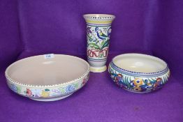 Three pieces of mid century design studio pottery by Poole a Vase a flower bowl and fruit bowl
