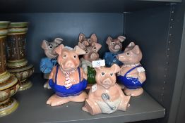 A selection of collectable ceramic piggy or money banks by Natwest
