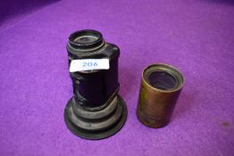 Two optical lens one military Ross AFV No.1 Mk1 F.V 158378 1982 monocular and a brass cased London