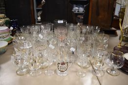 A selection of kitchen and table ware glass including sherry and wine etc