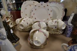 A selection of tea cups suacers and cake plates including Paragon and Adderley