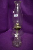 A Victorian pressed glass oil burning lamp