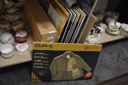 A selection of advertising boards for country clothing Beretta etc