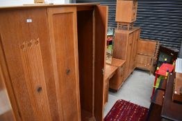 A vintage golden oak 5 piece bedroom suite , labelled White and Newton