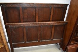 A set of Waring Gillows oak bed ends