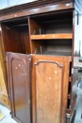 A Victorian mahogany wardobe having semi fitted interior