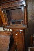 A small oak longcase clock case and movement (stamped Surtwangen) (no face)