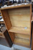 A set of vintage light bookshelves