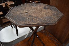 A vintage bamboo occasional table