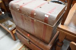 Two early 20th century tin trunks or bedding box one having scumble effect paint work