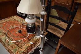 Two art deco styled mid century lamps in chrome and enamel